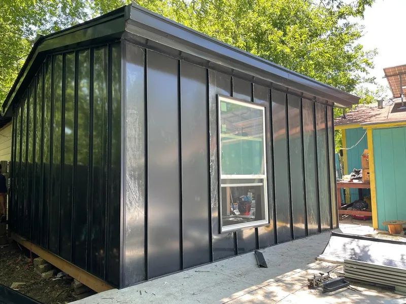 Black standing seam metal wall panels for Metal Roof Installation in Yazoo City